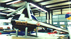 Trade Show Balloons for Island Booths - giant helium advertising inflatable helicopter shape. Say WOW.